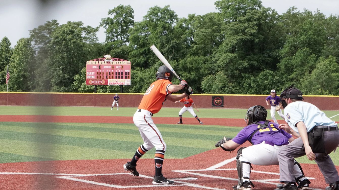  Players playing baseball on Ground 