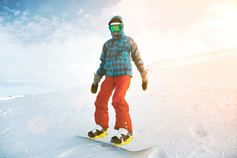 a person enjoying snowboarding